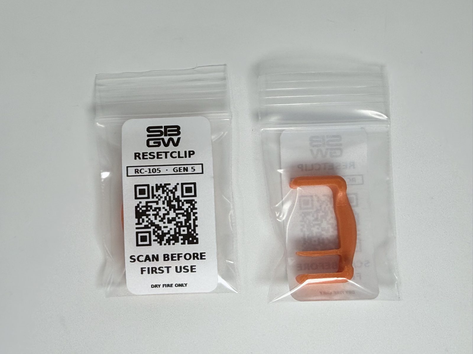 Two individually bagged ResetClips labelled RC-105, Gen 5, front and back, with a QR code reading Scan before first use.